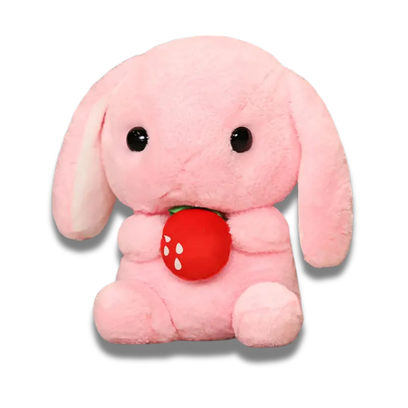 Un Doudou Bébé Lapinou de couleur rose bonbon avec une fraise entre ses pattes
